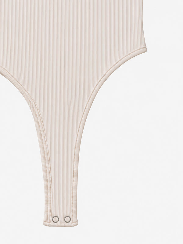 HALF BUTTON BODY - SOFT WHITE