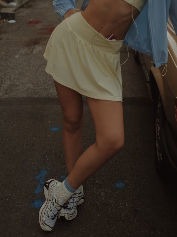 SPORTY MINI SKIRT - BUTTER YELLOW